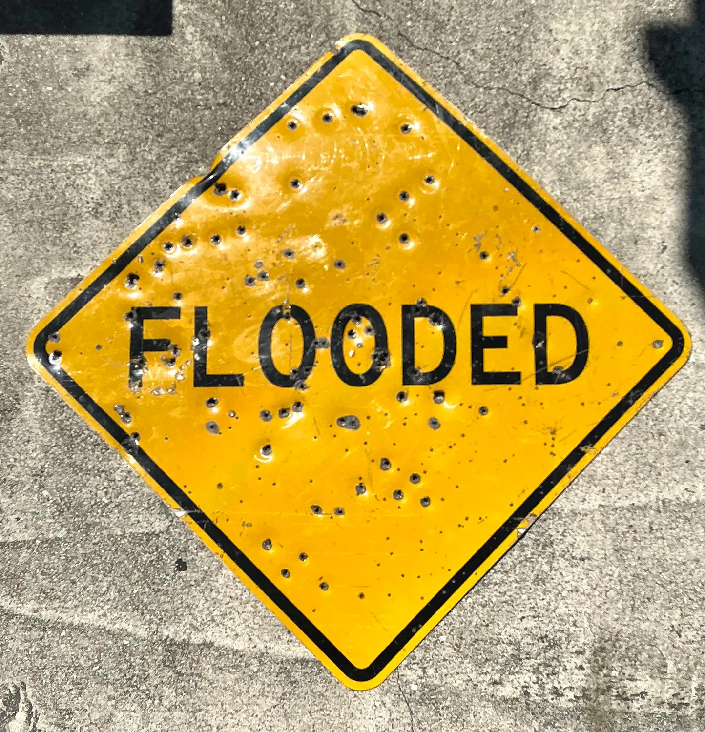 Vintage Bullet Flooded Sign