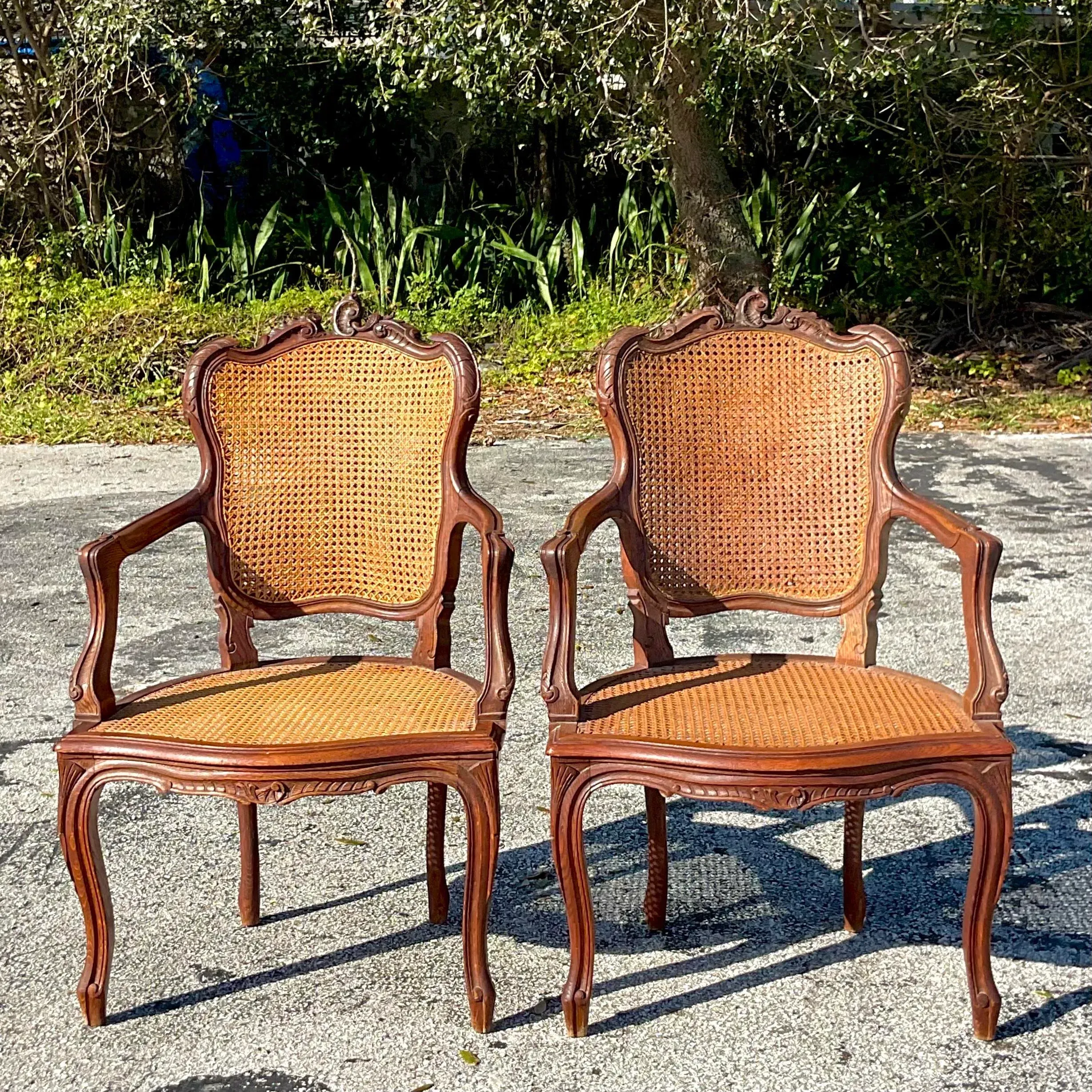 Vintage Boho Carved Wooden Chairs With Inset Cane Panels - a Pair